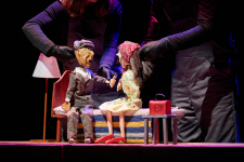 THE IMMIGRANT: A PUPPET TRAGICOMEDY IN 8 SCENES AND AN EPILOGUE